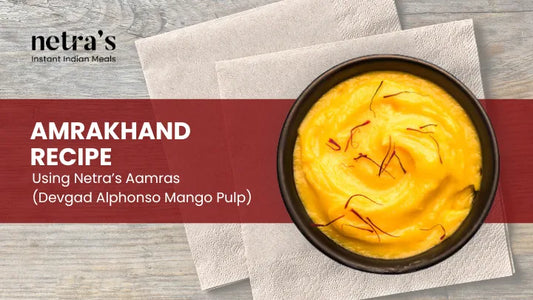 Creamy amrakhand in a bowl topped with pistachios