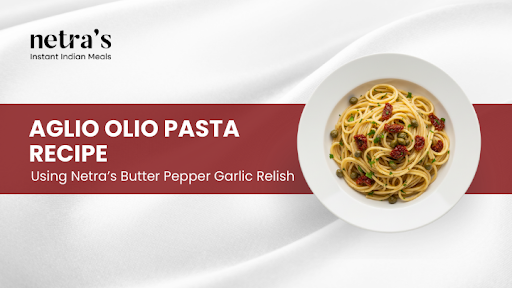 Aglio olio pasta served in a bowl with olive oil shine